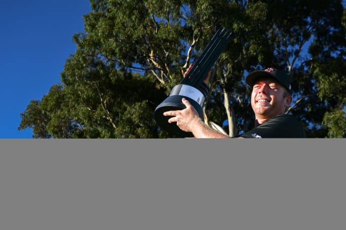 Talor Gooch of RangeGoats GC poses for a photo with his trophy after winning Liv Golf Adelaide at The Grange Golf Course on April 23, 2023 in Adelaide, Australia.